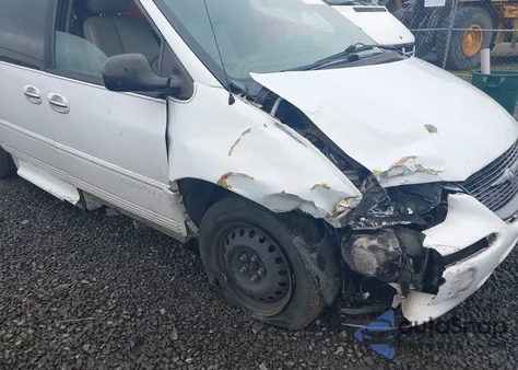 1999 Chrysler Town & Country Limited z USA, uszkodzony, nr VIN 1C4GP64L3XB916770